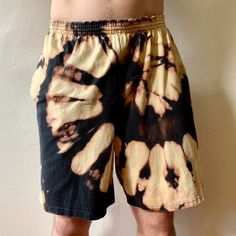 Vintage y2k Champion reverse tie dyed drawstring shorts. These shorts had some discoloration and have been reworked with a unique tie dye look. There are no holes and the drawstring is in tact and working. Marked XL. Waist: max 44 inches Length: 20 inches * Custom clothing and dye work upon request, more items can be viewed on instagram @r.e.e.e.gan or at shopreeegan.com * Use code ETSY on shopreeegan.com for 10% off at checkout! Festival Tie-dye Hand-dyed Bottoms, Festival Tie-dye Hand Dyed Bottoms, Hand Dyed Tie Dye Bottoms For Festival, Tie Dye Bottoms For Festivals, Relaxed Fit Tie-dye Hand Dyed Bottoms, Relaxed Fit Tie Dye Bottoms, Hand Dyed Tie Dye Cotton Bottoms, Casual Tie-dye Shorts With Relaxed Fit, Casual Tie Dye Shorts With Relaxed Fit