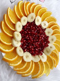 an orange and pomegranate fruit plate with the words happy valentine's day on it