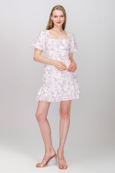 Elevate your wardrobe essentials with a dose of freshness with this mini floral print dress. Its girly charm and light pastel floral colors make it a perfect choice on any summer day.Size guide: For sizing, please refer to the following guide. If you have any questions about sizing or fit, we welcome you to call, email or DM us. Inches S (2/4) M (6) L (8) XL (10/12) Bust 34.6 36.2 37.8 39.4 Waist 28.3 29.9 31.5 33.1 Hip 37.8 39.4 40.9 42.5 Spring Feminine Mini Dress, Feminine Mini Dress For Spring, Cute Floral Print Mini Dress For Daywear, Cute Mini Floral Dress For Garden Party, Pink Floral Print Dress With Square Neck, Pink Mini Floral Print Dress, Cute Mini Floral Dress For Spring, Pink Floral Print Mini Length Dress, Pink Mini Length Floral Dress