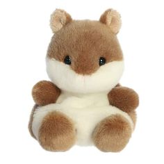 a brown and white stuffed animal sitting up