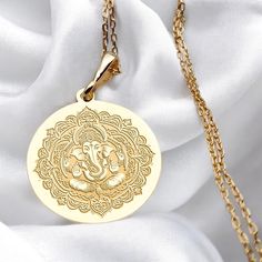 Celebrate spirituality and elegance with our 14K Gold Lord Ganesha Charm Necklace. This minimalist Hindu spiritual necklace features a beautifully detailed charm of Lord Ganesha, symbolizing wisdom, prosperity, and new beginnings. Crafted with high quality materials, this necklace is perfect for women who appreciate meaningful jewelry, making it an ideal gift for those who embrace Buddhist traditions or seek inspiration in their daily lives. 🌼 Handmade Necklace - Made to order 🌼 Colors: Silver Ganesha Necklace, Spiritual Necklace, Tiny Necklace, Buddhist Traditions, Meaningful Jewelry, 14k Gold Necklace, Necklace Minimalist, Pet Necklace, Necklace Women