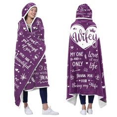 two women wearing purple hooded blankets with the words, i love you and many other things