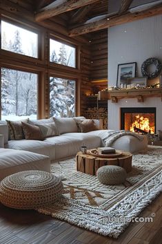 a living room filled with furniture and a fire place in front of a window covered in snow