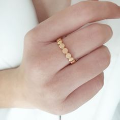 Dot eternity wedding band has a minimal design, and you can wear it any day and combine it with other jewelry . It makes for an excellent gift for a loved one, without being extravagant. - Gold Kt: 9K, 14K and 18K Solid Gold - We can make all three Gold Colors: Rose Gold, Yellow Gold, White Gold - Dimension: - Dimension: 1,5mmx3,9mm Dot eternity wedding band, Monogrammed initial ring groomsmen gift, Custom engraved ring, Dainty everyday ring, Family initial birthstone ✔ Ready to Ship in 7-10 Bus Minimalist Stackable Initial Ring For Anniversary, Wedding Hypoallergenic Stackable Rings With Round Band, Minimalist Stackable Wedding Jewelry, Modern Rose Gold Initial Ring, Minimalist Hypoallergenic Initial Ring, Hypoallergenic Minimalist Initial Ring, Modern Everyday Initial Ring In Rose Gold, Adjustable Tarnish Resistant Initial Ring For Wedding, Simple Stackable Wedding Jewelry