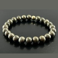 You will Absolutely LOVE this PYRITE Bracelet for Men or Women!  Made with High Quality Long Lasting 1mm Stretch Cord Wearing PYRITE every day can protect you and your loved ones from evil spirits and provide health and fortune to you and your family. Get some pyrite as quickly as you can if it speaks to you. ABUNDANCE is a Vibration ... Get tuned to that Vibration and everything you desire will FLOW to you.  Perfect for Valentine's Day Gift , Birthday Gift , Anniversary Gift ,  Graduation Gift, Beaded Bracelet For Men, Pyrite Bracelet, Bracelet Gift Box, Zodiac Bracelet, Crystal Healing Bracelets, Gift Graduation, Mens Beaded Bracelets, Unique Bracelets, Amethyst Bracelet