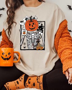 Halloween Skeleton Pumpkin Sweatshirt, Pumpkin Sweatshirt, Dancing Skeleton Shirt, Halloween Sweater, Spooky Skeleton Shirt, Fall Sweatshirt Hello,  Thank you for your support. Your satisfaction is our top priority. Every purchase you make supports our dreams :) Please read the information below: ---------- Product ---------- Comfort Colors® styles are garment dyed for that lived in feel and almost no shrinkage at home. * Soft ring spun cotton fabric with 100% cotton threads * Topstiched, classi Oversized Skull Print T-shirt For Fall, Spooky Long Sleeve T-shirt For Fall, Halloween Long Sleeve T-shirt With Skull Print, Halloween Long Sleeve Relaxed Fit T-shirt, Fall Skull Print Crew Neck Top, Spooky Skull Print Fall Top, Spooky Skull Print Tops For Fall, Spooky Skull Print Top For Fall, Halloween Skull Print Crew Neck Sweatshirt