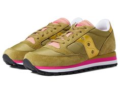 Saucony Originals Jazz Triple - Women's Shoes : Olive/Gold : Stretch your legs and feet in the comfort of the Saucony Originals Jazz Triple sneaker. Textile and synthetic upper. Lace-up closure. Round-toe silhouette. Textile lining and insole. Synthetic outsole. Imported. Measurements: Weight: 10 oz Product measurements were taken using size 8.5, width B - Medium. Please note that measurements may vary by size. Sneakers Athletic, Saucony Sneaker, Pink Yellow, Women's Shoes, Womens Sneakers, Athletic Shoes, Lace Up, Women Shoes, The Originals