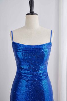 This dress features sequins in a royal blue color and a bodycon silhouette. The top is ruched and the skirt has a ruffle detail. It also has spaghetti straps, a lace-up back, and falls above the knee in length. Item #NP1104 Material: Sequin Color: Royal Blue Silhouette: Bodycon Embellishment: Ruched top, ruffle skirt Neck: Spaghetti straps Back: Lace-up Length: Above knee length Fully lined: Yes Built-in bra: Yes True to size. Made in China. Dresses are usually packed inside out for protection. Hand wash Blue Sequin Dress With Spaghetti Straps, Blue Sequin Spaghetti Strap Dress For Homecoming, Blue Sequin Dress With Spaghetti Straps For Homecoming, Sequence Outfits, Blue Silhouette, Hoco Dress, School Dance, Ruched Top, Royal Blue Dresses