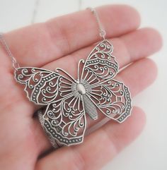 "Vintage Necklace - Silver Necklace - Butterfly Necklace - Filigree Necklace - Butterfly Jewelry - Statement Necklace - handmade jewelry This is such a fabulous necklace! A gorgeous silver plated filigree butterfly hangs from a pretty silver plated chain. So very feminine. Chloe says, \"Wear it and feel fabulous!\" The butterfly measures 2\" wide and 1 1/2\" long. You can choose the length you would like at checkout. Thanks for visiting Chloe's" Butterfly-shaped Filigree Jewelry Gift, Butterfly Shaped Filigree Jewelry Gift, Butterfly Filigree Jewelry As A Gift, Butterfly Filigree Jewelry Gift, Bohemian Butterfly Sterling Silver Necklace, Bohemian Sterling Silver Butterfly Necklace, Unique Handmade Butterfly Necklace, Handmade Silver Jewelry For Gift, Metal Necklaces With Intricate Design For Gift