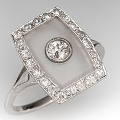 a diamond and white gold ring