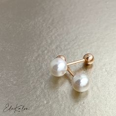 Dainty Pink Tint Genuine Japanese Akoya Pearl 18K Gold Screw back earrings  * Akoya Pearl size: Choice of 3.5-4mm/4.5-5mm/5.5-6mm/6.5-7mm * Screw back gold ball: approx. 3.5mm * Bar thickness: approx. 0.85mm * Metal: 18K Solid Gold choice of Yellow or Rose * Sold as Single or A Pair * Stamp: 18K 📌Production time: If in stock, will ship in 3-5 business days. Usually production time around 2-3 weeks, sometimes can take 3-4 weeks. ❤️Visit our official website for exclusive new products.      https://elekalonjewelry.com/ ❤️Follow us on Instagram @ elekalonjewelry for the latest projects and much more! ❤️If you have any questions, please feel free to message us. White Screw Back Earrings For Gift, Classic White Cartilage Earrings As Gift, Elegant White Round Cartilage Earrings, Elegant White Cartilage Earrings Gift, Elegant White Cartilage Earrings For Anniversary, Dainty Gold Earrings, Akoya Pearl Earrings, Helix Piercings, Helix Earring