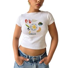 PRICES MAY VARY. Material: Graphic baby tees for women are made of 95% cotton and 5% spandex, lightweight, skin-friendly, soft, stretchy, breathable, comfortable to wear. Trendy baby tees for women teen girls 2024. Features: Y2k tops, short sleeve, round neck, fruit or food pattern print aesthetic tops, slim fit, crop tops, cute graphic tees for women teen girls, going out tops for women, grunge clothes for casual streetwear. Very fashion and attractive. Occasion: Graphic tees y2k, coastal summe Fruit Prints, Floral Clothing, Graphic Crop Top, Baby Graphic Tees, Women Y2k, Y2k Baby Tee, Aesthetic T Shirts, Floral Outfit, Casual Vest