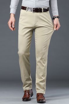 Portrait of a man wearing a Men’s Cotton Business Solid Color Pants. Men's Dress Pants, Pants Pocket, Blue Khakis, Dark Khaki