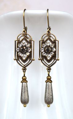 VINTAGE ELEMENTS Unique Jewellery, Handmade from Vintage Inspired Original Designs Art Nouveau, Art Deco, Edwardian, Victorian style Earrings with  Clear and black Diamond Crystals and Silvered Glass Teardrop. These earrings are made with antiqued brass  leverback earwires and measure 6.2cm from the top of the earwires. Jewelled Headpiece, Victorian Style Earrings, Antique Gold Earrings, Edwardian Art, Vintage Elements, Art Nouveau Art, Deco Earrings, Nouveau Art, Jewellery Handmade