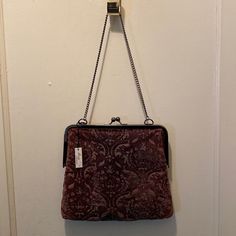 Great Looking Vintage Style Frame Bag With Chain Strap And Button Closure. The Front Of This Fabric Bag Is Beaded With Gunmetal Colored Caviar Beads That Highlight The Paisley Style Design Of The Velour “Ish” Fabric. A Gorgeous Figgy Purpley Brown Color. Great Holiday/Party /Evening Bag. A Little On The Larger Side. Will Definitely Hold A Larger Cell Phone Comfortably. 9” H X 10 1/4” Across Handle Drop Is 9 1/2”. Evening Bag With Detachable Handle In Burgundy, Evening Burgundy Bag With Detachable Handle, Burgundy Evening Bag With Removable Pouch, Burgundy Handheld Shoulder Bag For Evening, Vintage Burgundy Bag With Adjustable Strap, Rectangular Burgundy Clutch For Travel, Burgundy Rectangular Clutch For Travel, Burgundy Rectangular Travel Clutch, Burgundy Evening Pouch Bag