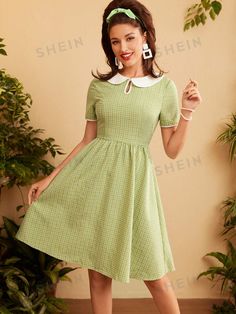 This vintage floral color block dress features a charming green cottagecore design with contrasting colors. Perfect for a sunny day out, it offers a stylish and unique look that will turn heads. Made with high-quality materials, it provides both comfort and fashion. Color : Green Style : Cute Details : Zipper Type : A Line Pattern Type : Gingham, Colorblock, Geometric Sleeve Length : Short Sleeve Neckline : Peter Pan Collar Sleeve Type : Puff Sleeve Waist Line : High Waist Hem Shaped : Flared Le Casual A-line Vintage Dress For Garden Party, Green Mini Dress For Picnic, Green Casual Dress For Picnic, Casual Green Dress For Picnic, Spring Preppy Knee-length Dress, Green A-line Patchwork Dresses, Green A-line Vintage Summer Dress, Green A-line Dress With Patchwork, Green Spring Picnic Dress