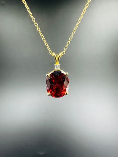 Oval Cut Red Garnet Diamond , 14k Yellow Gold Plated , Garnet pendant necklace ,Minimalist Necklace, Women's Necklace, Christmas Gift Material: High Quality Solid 925 Sterling Silver * Finish: Sterling Silver ∙ 14K Gold * I N F O R M A T I O N * Every item is tastefully wrapped and presented in lovely jewellery boxes. Reusable and biodegradable, our jewellery boxes * Are you interested in your own design or looking for advice? Do not hesitate to contact us! We take pride in our quick response times and are ready to help you. SHIPPING TIME * 3 TO 5 Business Days With USPS Priority Mail CHECKOUT OUR STORE FOR NEW EXCLUSIVE DESIGN: https://garnetcreationdesign.etsy.com Thank you immensely for choosing to visit our store, and we sincerely hope that your shopping experience with us surpasses yo Luxury Garnet Necklace For Anniversary, Classic Red 14k Gold Necklace, Fine Jewelry Yellow Gold Garnet Necklaces, Gold Oval Garnet Necklaces, Yellow Gold Garnet Necklaces With Oval Shape, Yellow Gold Oval Garnet Necklace, Oval Garnet Gold Necklace, Formal Yellow Gold Garnet Necklaces, Formal Yellow Gold Garnet Necklace