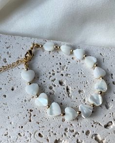 "Stunning shell pearl heart bracelet *MADE TO ORDER PIECE* ✨LENGTH  6.5\" with 1.5\" extender as standard but as it's made to order if you require a different size just leave a note at checkout ✨PROCESSING AND SHIPPING Everything in our shop is made to order. Processing time is the time it takes us to produce your custom made piece, this does not include shipping time. Processing time varies depending how busy we are so please ensure you check our current processing time before you order 💖 We a Scotland Uk, Pearl Heart, Freshwater Pearl Bracelet, Initial Bracelet, Just Leave, Dainty Bracelets, Freshwater Pearl Necklaces, Crystal Pearls, Heart Bracelet