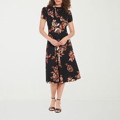 You'll love the flattering and flowy fit-and-flare silhouette and rich floral pattern of this London Style women's dress. It's made from stretch scuba and has a chic split tie neck, short cap sleeves, a midi-length, and a back zipper closure. Elevate it with your favorite heels and minimal jewelry.Closure Type: ZipperNeckline: Split Tie NeckSleeve Length: Short SleeveSleeve Style: Cap SleeveApparel Length: 42.25 InchesDress Length: Midi LengthFiber Content: 96% Polyester, 4% SpandexFabric Descri Stretch Floral Print Midi Dress, Summer Floral Midi Dress For Work, Floral Print Stretch Maxi Dress With Short Sleeves, Stretch Floral Print Maxi Dress With Short Sleeves, Elegant Stretch Floral Print Maxi Dress, Elegant Stretch Maxi Dress With Floral Print, Black Floral Print Dress For Work, Elegant Short Sleeve Floral Dress, Elegant Floral Dress For Workwear