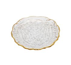 a clear glass bowl with gold rim