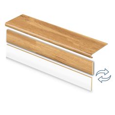 the side profile of a wooden skirting board with an arrow pointing up to it