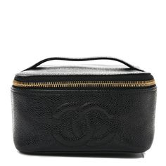 This is an authentic CHANEL Caviar Vanity Cosmetic Case in Black. This chic case is crafted of textured caviar leather in black. The bag features aquilted Chanel CC logo on the front, a 3/4 wrap-around gold top zipper, and a leather top handle. The top opens toa black leather interior with a patch pocket. Black Caviar Leather Evening Bag, Designer Caviar Leather Bag With Textured Finish, Designer Bags In Textured Caviar Leather, Everyday Luxury Caviar Leather Bag, Luxury Caviar Leather Bag For Everyday, Designer Caviar Leather Bags For Formal Occasions, Classic Formal Caviar Leather Bag, Luxury Caviar Leather Evening Bag, Elegant Bag In Textured Caviar Leather