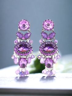 Beautiful handmade earring with crystals, bright colors, lilac with silver, on a stainless steel base, for pierced ears. Medium size, 6 cm long. very light. Purple Crystal Jeweled Earrings, Purple Jeweled Crystal Earrings, Glamorous Purple Drop Earrings, Purple Sparkling Crystal Earrings For Parties, Purple Crystal Rhinestone Earrings, Purple Rhinestone Dangle Earrings, Purple Rhinestone Drop Earrings, Purple Rhinestone Crystal Earrings For Party, Purple Crystal Earrings With Rhinestones