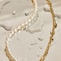 Always classical with the best of both worlds; a blend of half link chain in gold vermeil and half freshwater pearl design with a clasp fastening, the Sonette Pearl Necklace is the optimum finish of contemporary look for everyday and evening wear.Made from 925 Sterling Silver and coated with a thick layer of pure 18K Yellow Gold to a Gold Vermeil thickness. 100% nickel-free, hypoallergenic, long-lasting lustre with proper care.Intrigued by the sensorial aesthetics of waves, The Ria Collection sy Classic Gold Pearl Necklace For Everyday, Classic Gold Pearl Necklace For Everyday Elegance, Gold Akoya Pearl Necklace In Timeless Style, Classic Gold-plated Pearl Chain Necklace, Luxury Gold Chain Necklace With Pearl Charm, Luxury Everyday Pearl Chain Jewelry, Luxury Yellow Gold Baroque Pearl Necklace, Elegant Baroque Pearl Chain Jewelry, Luxury Pearl Chain Necklaces For Everyday