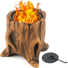 a fire pit made out of a tree stump