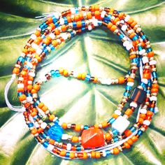 Custom Tie On 50" Waist-Beads, Tanagerine Orange, White,Teal,Gold, Burnt Orange. Orange Represents Confidence & Creativity. Love And Celebrate Your Body, Worn For Cultural Awareness, Weigh Loss Management, Goal Manifestation. Bohemian White Waist Beads With Colorful Beads, Bohemian White Waist Beads For Festivals, Adjustable White Bohemian Waist Beads, Bohemian Waist Beads For Beach In Summer, Bohemian Waist Beads For Summer Beach, Bohemian Colorful Waist Beads For The Beach, Bohemian Summer Festival Waist Beads, Orange Multi-strand Beaded Necklaces For Beach, Adjustable Faceted Waist Beads For Beach