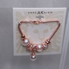 Bracelet Copper Tone,Looks Gold Tone At First Glance, But Picture 1 Is More Of Its Tone, 3 Flaux Pearls, Two Beads Have Clear Rhinestones In Each By Anne Klein Ak. Very Lightweight. New With Tags. Did Not Removed From Card For Pictures. Measurements Unable To Get Measurements Do To Not Removed From Card For Pictures Or Measurements. Should Fit Wrists Up To Large. # Ad-17 Pearl Bracelets With Spacer Beads, Elegant Pearl Beaded Charm Bracelet, Pearl Charm Bracelet In Metal, Pearl Bracelet With Spacer Beads, Metal Pearl Bracelet With Pearl Charm, Elegant Beaded Metal Charm Bracelet, Elegant Beaded Charm Bracelet, Party Charm Bracelet With Dangle, Elegant Beaded Charm Bracelet For Jewelry Making