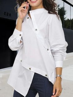 White Asymmetrical Top For Fall, White Asymmetrical Tops For Work, White Asymmetrical Tops For Workwear, Spring Asymmetrical Tops With Buttons, Spring Tops With Buttons And Asymmetrical Hem, Spring Tops With Asymmetrical Hem And Buttons, Chic Tops With Asymmetrical Hem And Buttons, Chic Top With Buttons And Asymmetrical Hem, White Workwear Shirt With Asymmetrical Hem