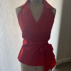 Beautiful Cotton With A Little Stretch Red Halter Blouse. Wrap Style That Ties In Front. Size 10 But Fits Size 8 Dress Form Well. Purchased Years Ago But Never Worn. Still Has Tags. Elegant Red V-neck Blouse, Red Fitted V-neck Top, Red V-neck Top For Office, Formal Solid Sleeveless Top, Formal Sleeveless Solid Color Tops, Formal Sleeveless Solid Tops, Sleeveless Cotton Blouse For Party, Cotton Sleeveless Blouse For Party, Red Sleeveless Fitted Blouse