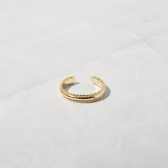 Toe rings are a must have in the spring/summer months! They add such a nice touch to your look. Great for sandals, flip flops & beach days! This toe ring features an adjustable design with a spiral border design for a dainty touch! Made of 925 Sterling Silver THICK plating of 14k Gold or Rhodium VERY HIGH QUALITY Nickel-free & Hypoallergenic 🎁 Comes in a gift-box, ready for gift giving!✈️ Ships same day for fast delivery!♡ Made with 100% Pure Love! Summer Beach Midi Rings, Trendy Adjustable Rings For Spring, Trendy Adjustable Spring Rings, Trendy Adjustable Midi Rings For Summer, Adjustable Midi Rings For Summer, Elegant Rings For Summer Beach Occasions, Elegant Summer Beach Rings, Trendy Adjustable Rings For Summer, Adjustable Midi Rings For Beach