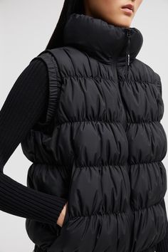 Defined by ruches, the Apriate down vest is a new interpretation of feminine designs. The puffer vest fuses a modern aesthetic with technical performance, being rafted from an extremely soft and down-proof fabric. The warmer has a versatile shape that layers well over workwear or weekend casuals. Vests For Women, Outerwear Vest, Down Vest, Feminine Design, Modern Aesthetic, Puffer Vest, Short Pants, Down Jacket, Vest Jacket