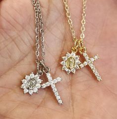 12x9x2mm Gold and Silver Plated Brass Dainty Blessed Mother Charm has beautiful Prong Set High Quality Cubic Zirconia. Stunning Prong Set Cubic Zirconia Cross Pendant is Gold and Silver Plated Brass and is 19.5x9mm. Gold Chain is Gold Plated brass, Silver Is Stainless Steel, 1mm cable link, 16" with a 2" extender chain and Lobster Clasp. If you want for a child, please specify length or age in note section Silver Tarnish Resistant Necklace For Wedding, Silver Tarnish-resistant Wedding Necklaces, Silver Tarnish Resistant Wedding Necklace, Silver Tarnish-resistant Wedding Necklace, Miraculous Medal Jewelry Gift For Mother's Day, Miraculous Medal Necklace For Mother's Day Gift, Mother's Day Gift Jewelry With Miraculous Medal, Dainty Cross Jewelry In Cubic Zirconia, Dainty Cubic Zirconia Cross Jewelry