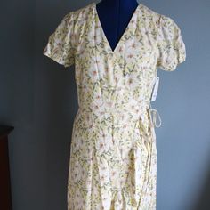 Mi Ami Women's Yellow Floral Short Sleeve Wrap Ruffle Hem Midi Dress ~M~ Nwt New With Tags Msrp 66.00 Please See All Pictures They Are Part Of The Description Please Ask Questions If You Have Any I Will Do My Best To Answer Them Brand: Mi Ami Model: Midi Wrap Dress Size: M Women's Color: Yellow Floral V-Neck Wrap Dress Material: 84% Rayon 16% Linen Type: Midi Dress Ties At Waist Approximate Measurements In Inches Lying Flat: To Help Determine Fit, Compare It To An Item You Currently Wear Pit To Yellow Knee-length Midi Dress In Feminine Style, Feminine Yellow Knee-length Midi Dress, Feminine Fitted Yellow Maxi Dress, Fitted Feminine Yellow Maxi Dress, Feminine Yellow Fitted Maxi Dress, Fitted Yellow Feminine Maxi Dress, Feminine Yellow Maxi Dress For Spring, Feminine Yellow Midi Dress For Daywear, Feminine Yellow V-neck Midi Dress