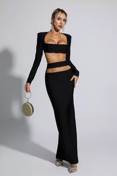 All eyes will be on you in our Sutton Black Bandage Set. This bandage set makes a statement in black bandage fabric, an exposed waist and a classic square neckline. Show your body's natural curves in this maxi dress for sensual appeal. Complete your stylish look with a handbag and heels!  Top Length: Approx 28cm Skirt Length: Approx 111cm Materials: Bandage (90% Rayon, 9% Nylon, 1% Spandex) Gentle Dry Clean Only  Model is 5 ft 7 and wears size S  Colour may vary due to lighting on images. The pr Midi Dress Work, Glitter Wedding Dress, Red Corset, Bandage Midi Dress, Sequin Maxi Dress, Floral Shirt Dress, Feather Dress, Puff Sleeve Dresses, Natural Curves