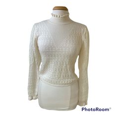 Zara Womens Ivory Long Puffed Sleeve Mock Neck Pullover Sweater Size Large Brand: Zara Department: Women Color: Ivory Size: L Type: Sweater Style: Pullover Feature: Comfort Easy Care Closure: Pullover Pattern: Abstract Theme: Classic Occasion: Casual Season: Fall Winter Condition: New With Tags White High Neck Sweater For Spring, Feminine Cream Long Sleeve Sweater, Elegant Fitted Winter White Sweater, Elegant Winter White Turtleneck Top, Fitted Elegant Winter White Sweater, Fitted Cream Sweater For Layering, White Feminine Sweater For Fall, Vintage White Tops For Layering, Feminine Winter Puff Sleeve Tops