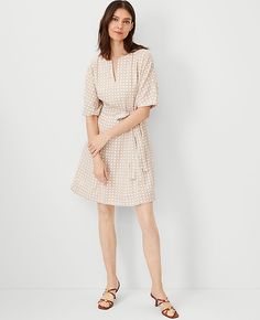 Elevate your wardrobe with the Ann Taylor Petite Lattice Linen Blend Split Neck Flare Dress, a perfect blend of elegance and comfort. This dress is designed to simplify your dressing routine, whether for work, weekends, or special occasions.

- **Size:** Petite 4
- **Color:** Baguette
- **Material:** Shell: 54% Linen, 46% Viscose; Lining: 100% Cotton
- **Gender:** Female
- **Features:** Split crew neck, elbow sleeves, self-tie belt, hidden back zipper with hook-and-eye closure, lined body

Craft Getaway Dress, Female Features, Work Sweaters, Tall Dresses, Style Steal, Getting Dressed, Tweed Dress, Sleeve Dresses, Midi Maxi Dress