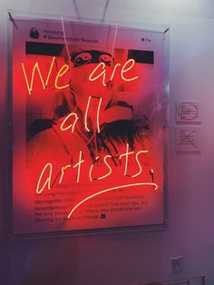 a neon sign that says we are all artists