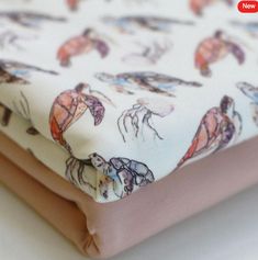 Price is for 1M - £5.00 per M Jersey Cotton Turtle Fabric Quality : 92% Cotton 8% Elastane Width:  145cm Weight: 220 grams/m2 Pattern size: Height 40 cm, Width 40 cm Information:  High quality, digitally printed Jersey Cotton, ideal for baby and children's clothing.  The fabric is knitted together with very long threads, so that it does not fray easily after cutting. You will see right stitches on one side and left stitches on the other. Only the front of the fabric has a v-pattern. This is call Pink Turtle, Printed Jersey, Knitting Techniques, Jellyfish, Halloween Shopping, Childrens Clothes, Bed Pillows, Cotton Fabric, Pet Supplies