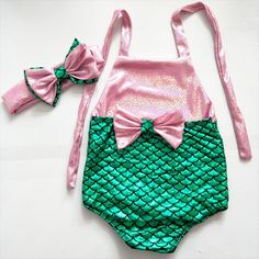 Size; 3-6 Months 6-12 Months 12-18 Months 18-24 Months Material: 20% Elastane And 80% Polyamide Care: Machine Wash Playful Mermaid Swimwear For Summer, Pink Onesie For Summer Birthday, Pink Onesie For Birthday In Summer, Pink Summer Birthday Onesie, Pink Mermaid Swimwear For The Beach, Pink Mermaid Beach Swimwear, Fitted Pink Bubble Romper For Party, Playful Pink Sets With Matching Headband, Playful Pink Bubble Romper For Party