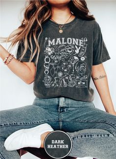 Post Malone Album Concert Shirt, **Welcome to MinasApparel - Your Destination for Timeless and Comfortable Fashion** At MinasApparel, we take pride in offering you clothing that seamlessly blends comfort, style, and quality. Our collection of T-shirts and sweatshirts is crafted to meet your everyday needs, providing versatility and ease no matter the occasion. **Key Highlights - **Artisanal Quality Each item is handmade with a focus on superior craftsmanship, ensuring durability and a perfect fit. - **Thoughtful Design Our apparel is designed to offer a unique look that effortlessly enhances your wardrobe. - **Premium Fabrics We use only the finest materials, chosen for their softness, breathability, and longevity. - **High-Density Knit Crafted with a tight knit for superior print quality Post Malone Concert Outfit, Post Malone Album, Post Malone Concert, Ghost Malone, Rap Shirt, Concert Shirts, Post Malone, Hottest Trends, Comfortable Fashion