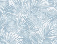 a blue and white wallpaper with palm leaves