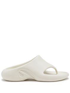 cream white slip-on style branded insole chunky sole round toe Comfortable White Sandals With Rubber Sole, White Open Toe Flip Flops With Arch Support, White Open Toe Slippers With Rubber Sole, White Slides With Arch Support, White Casual Flip Flops With Textured Footbed, White Slippers With Textured Sole And Round Toe, Casual White Flip Flops With Textured Footbed, White Synthetic Slippers With Rubber Sole, White Synthetic Slides With Arch Support