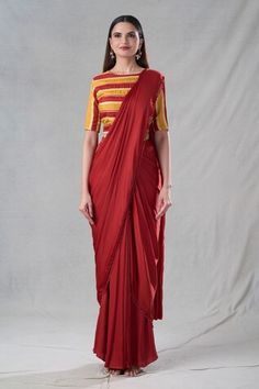 Rust pre-drape saree featuring dangling pipe and bead detailing on the hem. Paired with stripe pattern padded blouse. - Aza Fashions Traditional Draped Festive Blouse, Festive Pre-draped Silk Saree, Traditional Drape Saree With Draped Sleeves For Diwali, Diwali Saree With Draped Sleeves In Traditional Drape, Traditional Pre-draped Saree For Diwali With Draped Sleeves, Diwali Saree With Draped Sleeves And Traditional Drape, Diwali Saree With Draped Sleeves, Pre-draped Saree With Unstitched Blouse For Festivals, Traditional Draped Blouse With Draped Sleeves