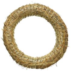 a round wreath made out of straw is shown on a white background with clippings