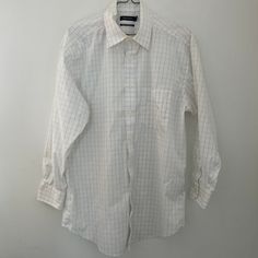 90s Nautica button up oxford shirt White with a dotted black and gray windowpane pattern single breast pocket long sleeve made in Malaysia 100% cotton wrinkle-resistant labeled size L Measurements taken flat double when necessary Shoulder to shoulder 20" Pit to pit 28" Shoulder to hem 29" Sleeve length 22" Due to the nature of vintage, all items in my store are sold as is. All sales are final without exception, I have a no returns/refunds policy. However, please contact me if there is a problem Casual Plaid Dress Shirt For Business, Plaid Button-up Business Tops, Business Plaid Button-up Top, Plaid Button-up Tops For Business, Casual White Long Sleeve Dress Shirt, Formal Plaid Collared Shirt, Casual Plaid Cotton Dress Shirt, Casual Plaid Long Sleeve Dress Shirt, Casual White Dress Shirt For Fall