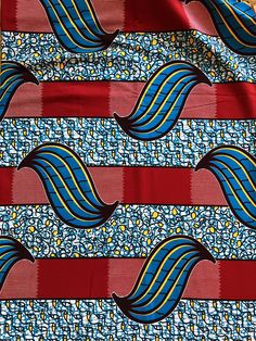 two pieces of fabric with wavy designs on them, one red and the other blue